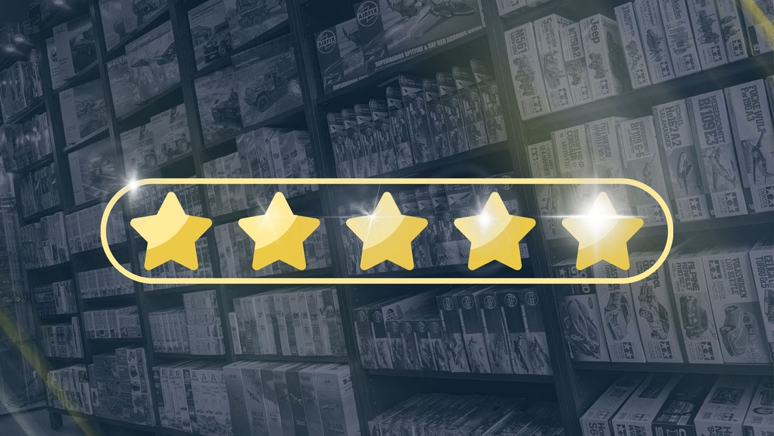 Five gold stars over shelves of model kits at SuperModels