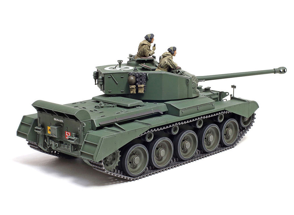 Model tank with two figures on a white background