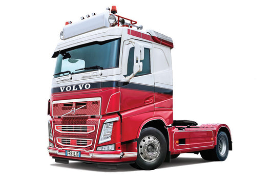 Red and white Volvo truck on a white background