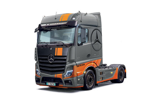 Mercedes-Benz truck with orange accents on a white background