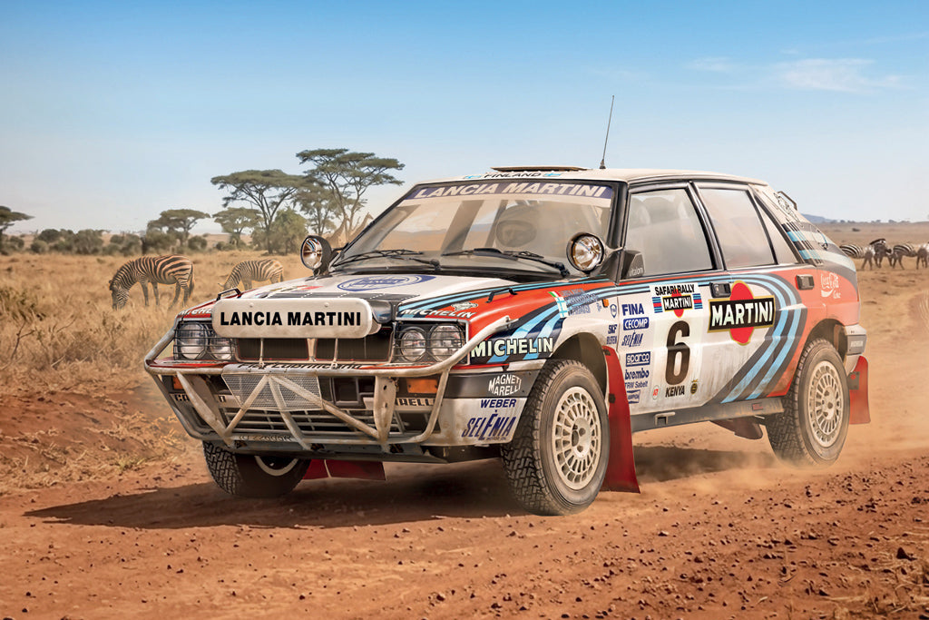 Lancia Martini rally car on a dirt track with wildlife in the background