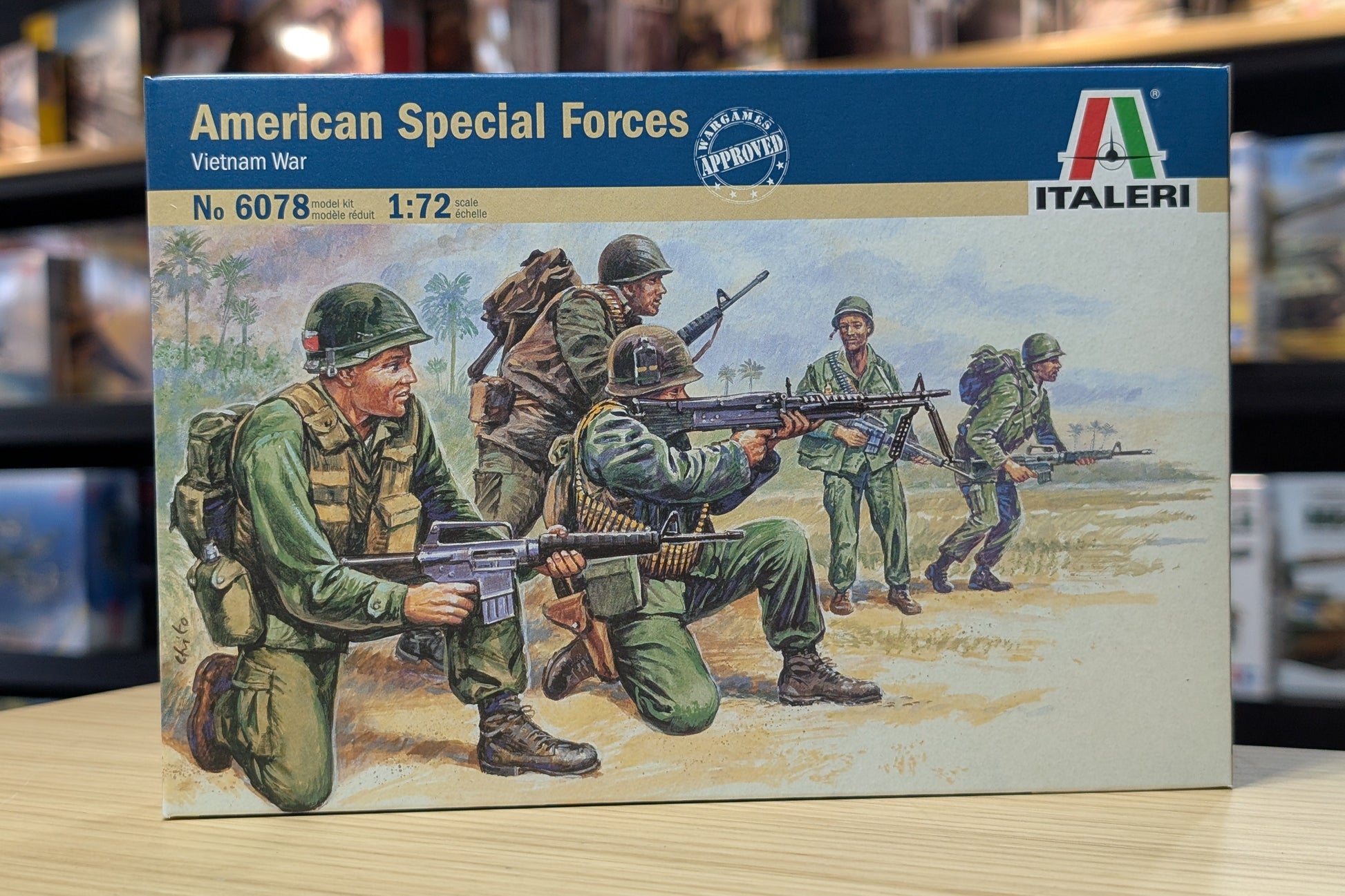 Model kit box for American Special Forces Vietnam War scenario by Italeri on a wooden surface. Italeri 1/72 Figures - 1/72 Vietnam War U.S. Special Forces - 6078